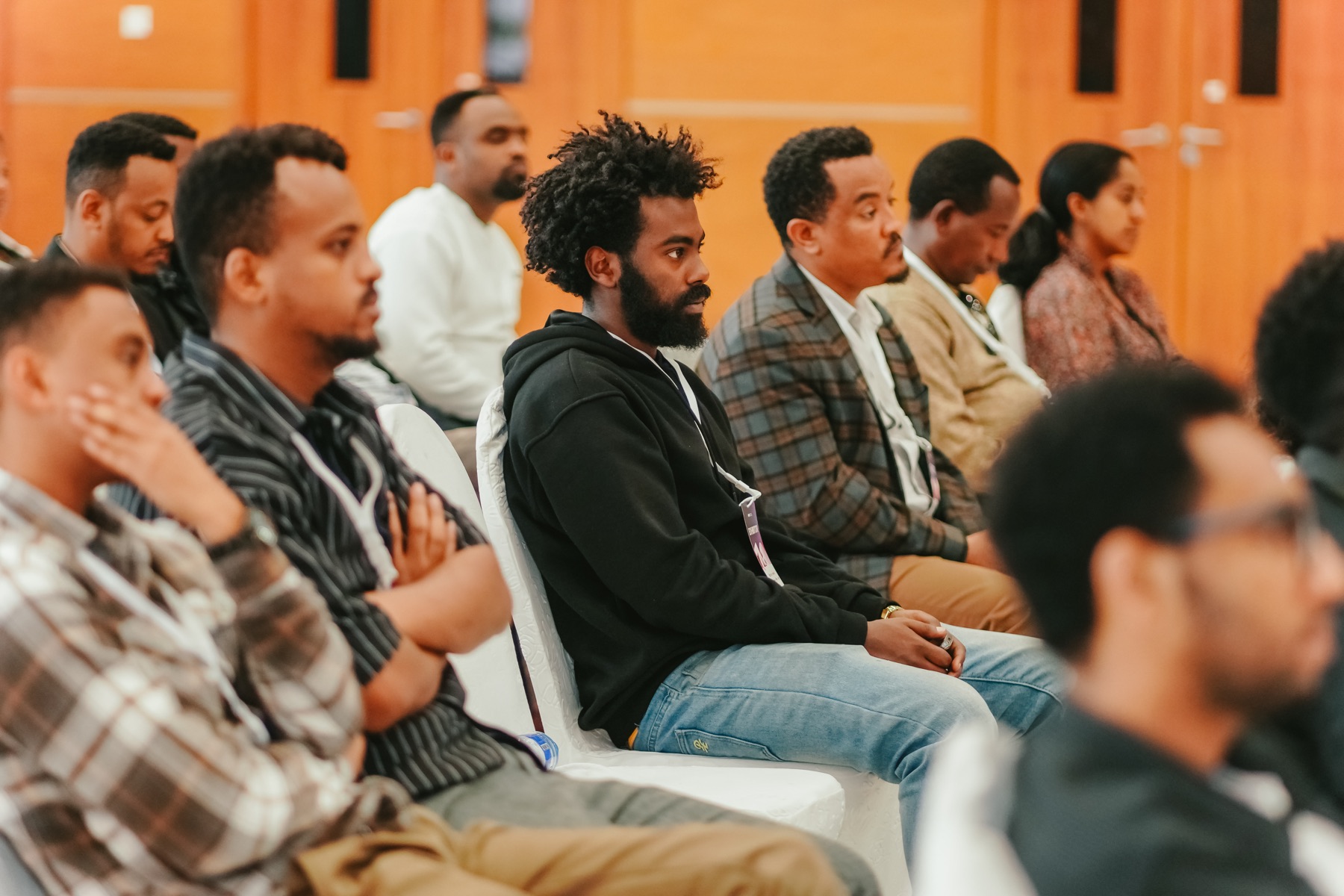Attendees listening during an innovation and technology session