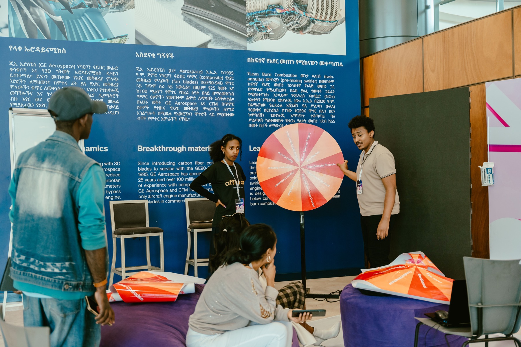 Summit attendees exploring an interactive startup exhibition